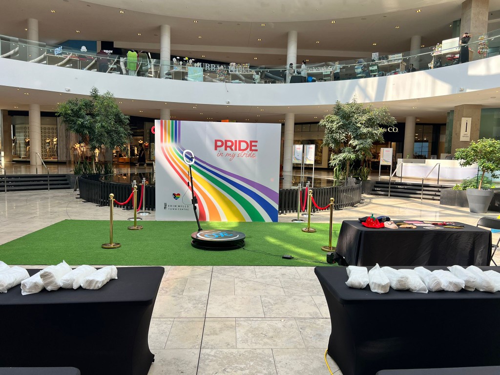 360 video booth and a backdrop with props